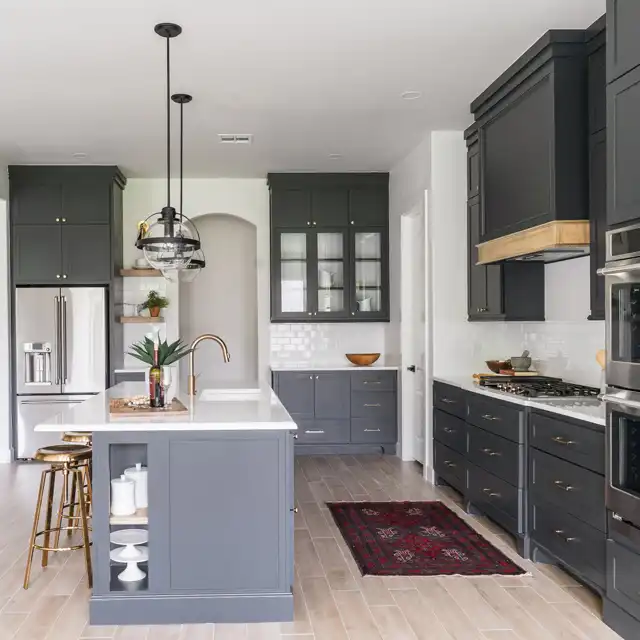 Modern Kitchen with Dark Gray Cabinetry, Brass Hardware and Central Island Design