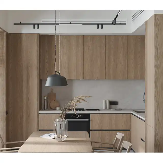 Modern Kitchen Renovation with Light Wood Cabinetry and Matte Black Accents