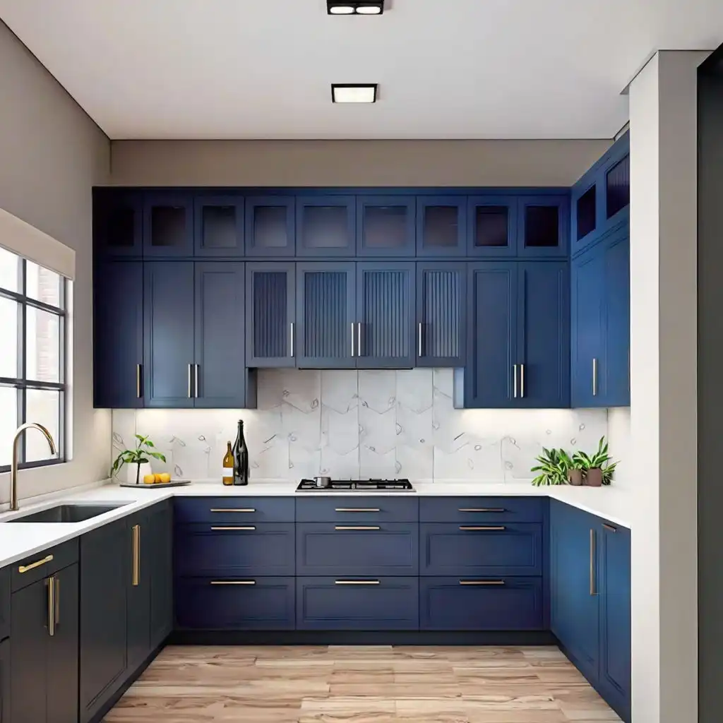 Deep Navy Blue Kitchen Cabinets with Gold Hardware and Marble Backsplash