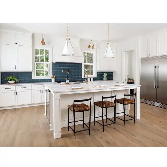 Bright White Kitchen with Navy Blue Backsplash and Central Island Design