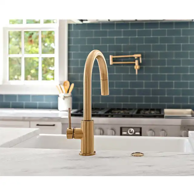 Bright White Kitchen with Navy Blue Backsplash and Central Island Design