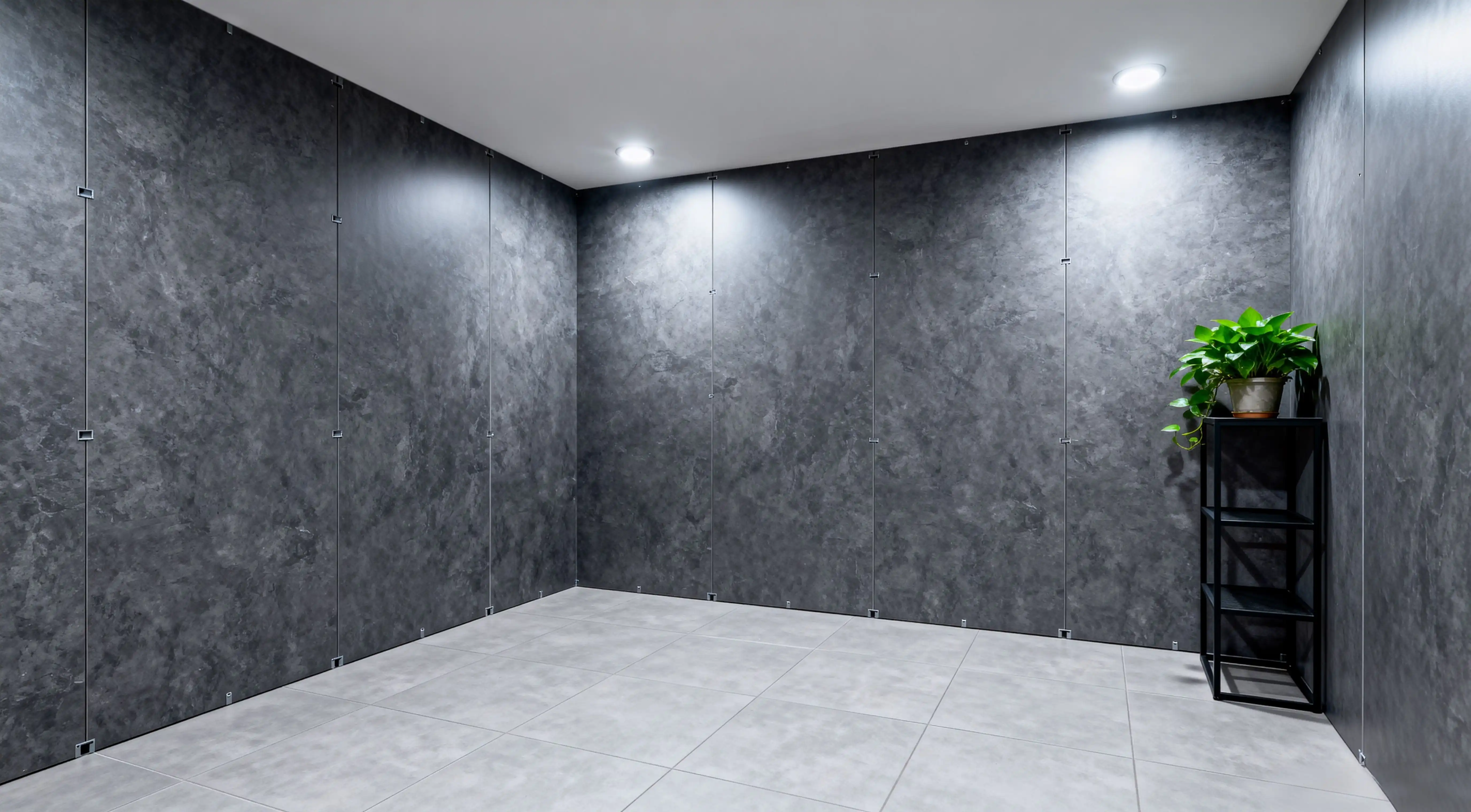 Moisture-Proof Basement with Dark Gray Textured Wall Panels and Recessed Lighting
