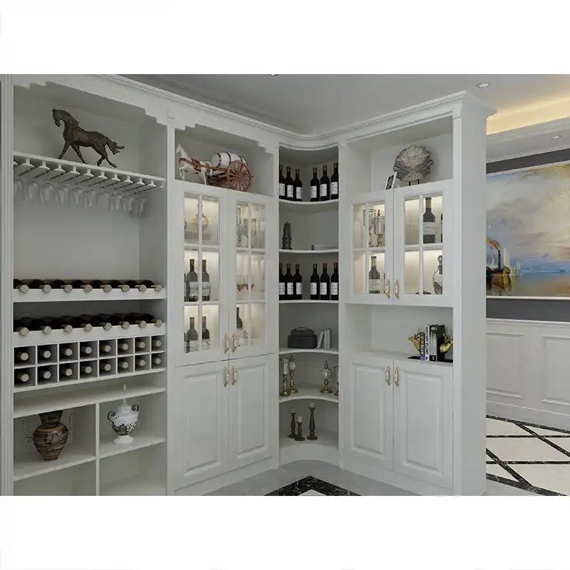 Elegant white wooden wine cabinet with glass doors, brass hardware, wine bottle storage racks, and decorative display shelves in luxury home interior