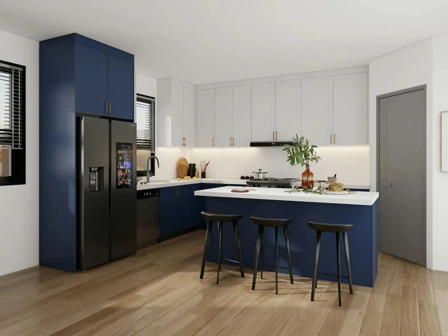 Contemporary kitchen with navy blue lower cabinets, white upper cabinets, black island stools, and stainless steel appliances.