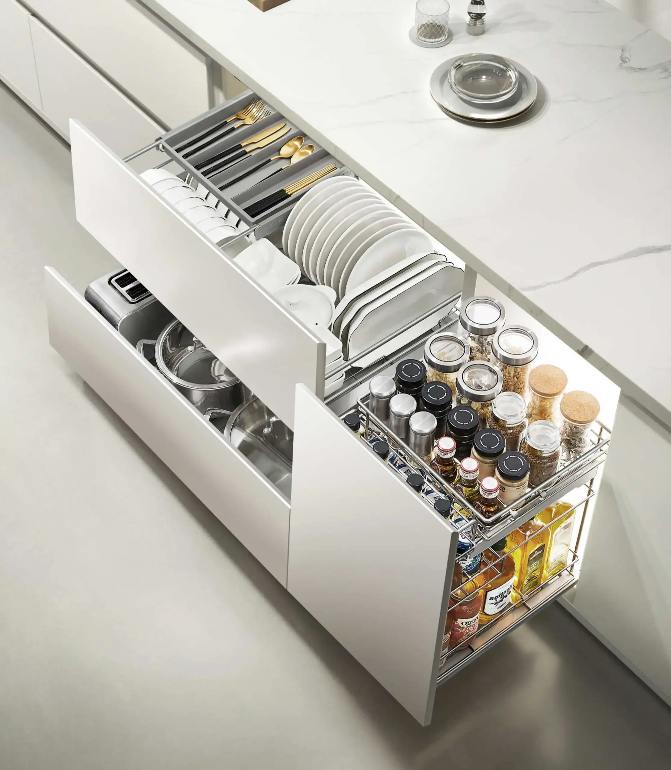 L shaped kitchen corner solutions 2 scaled Top-down view of an L-shaped cabinet interior featuring large-capacity dish drawers and a side-mounted metal wire spice pull-out.