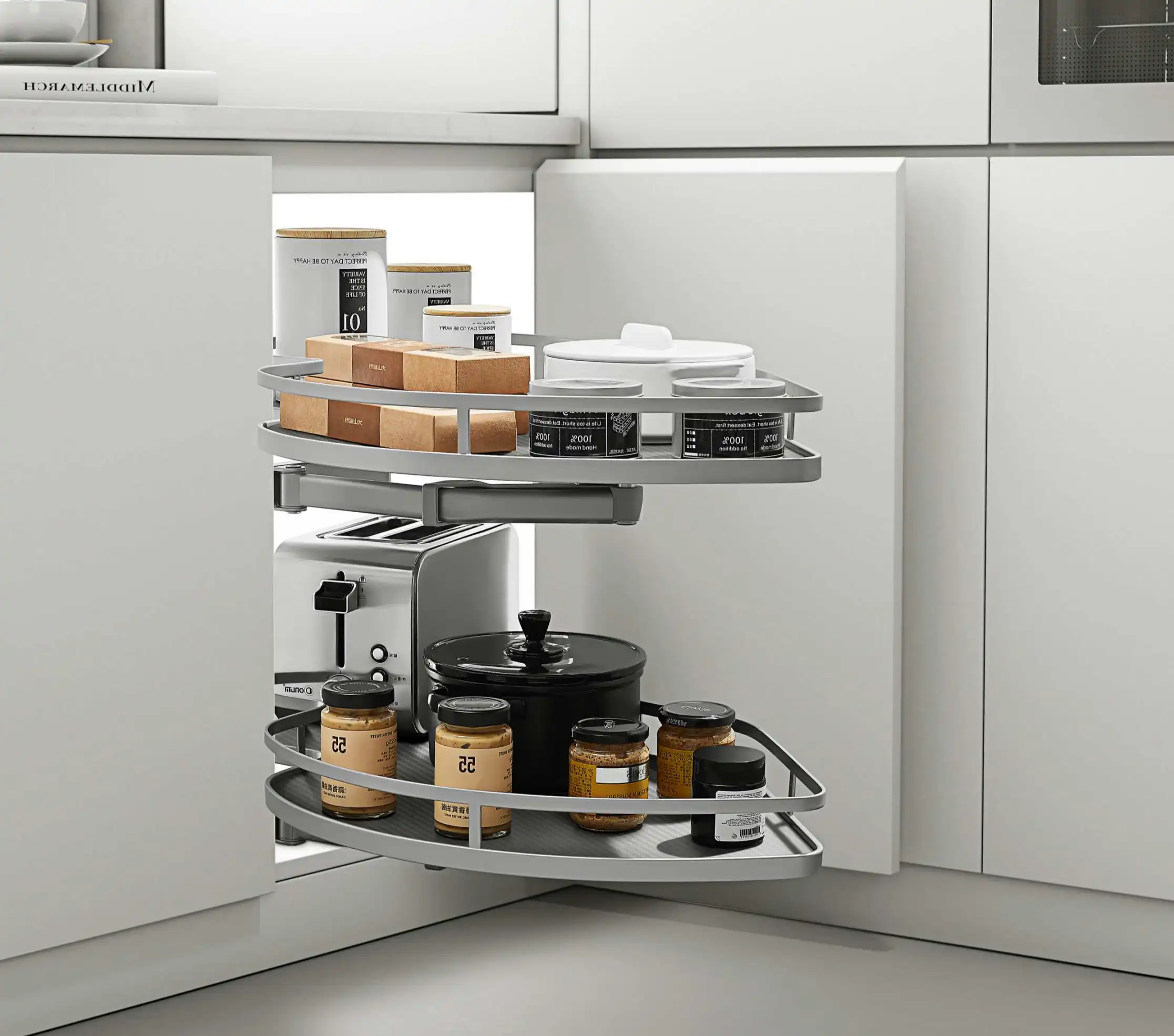 L shaped kitchen corner solutions 4 A two-tier grey metal pull-out organizer installed in an L-shaped kitchen corner base cabinet, displaying various jars and small appliances.
