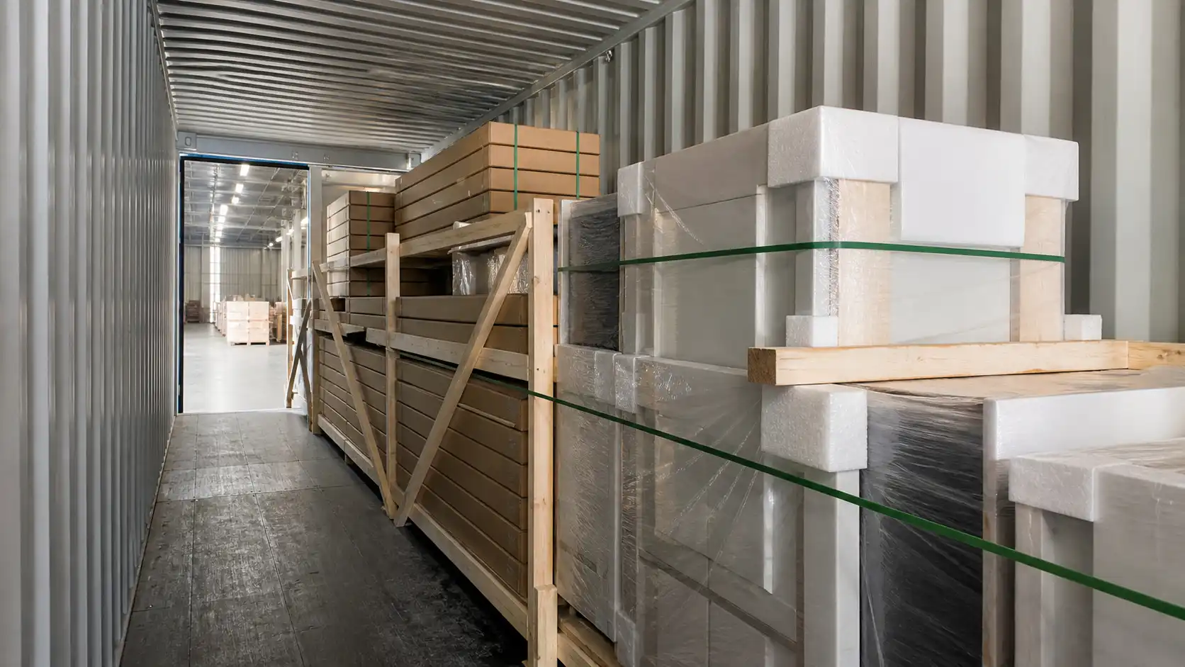 05 cabinet container loading plan Protected custom cabinet packs secured inside a container for overseas shipment.