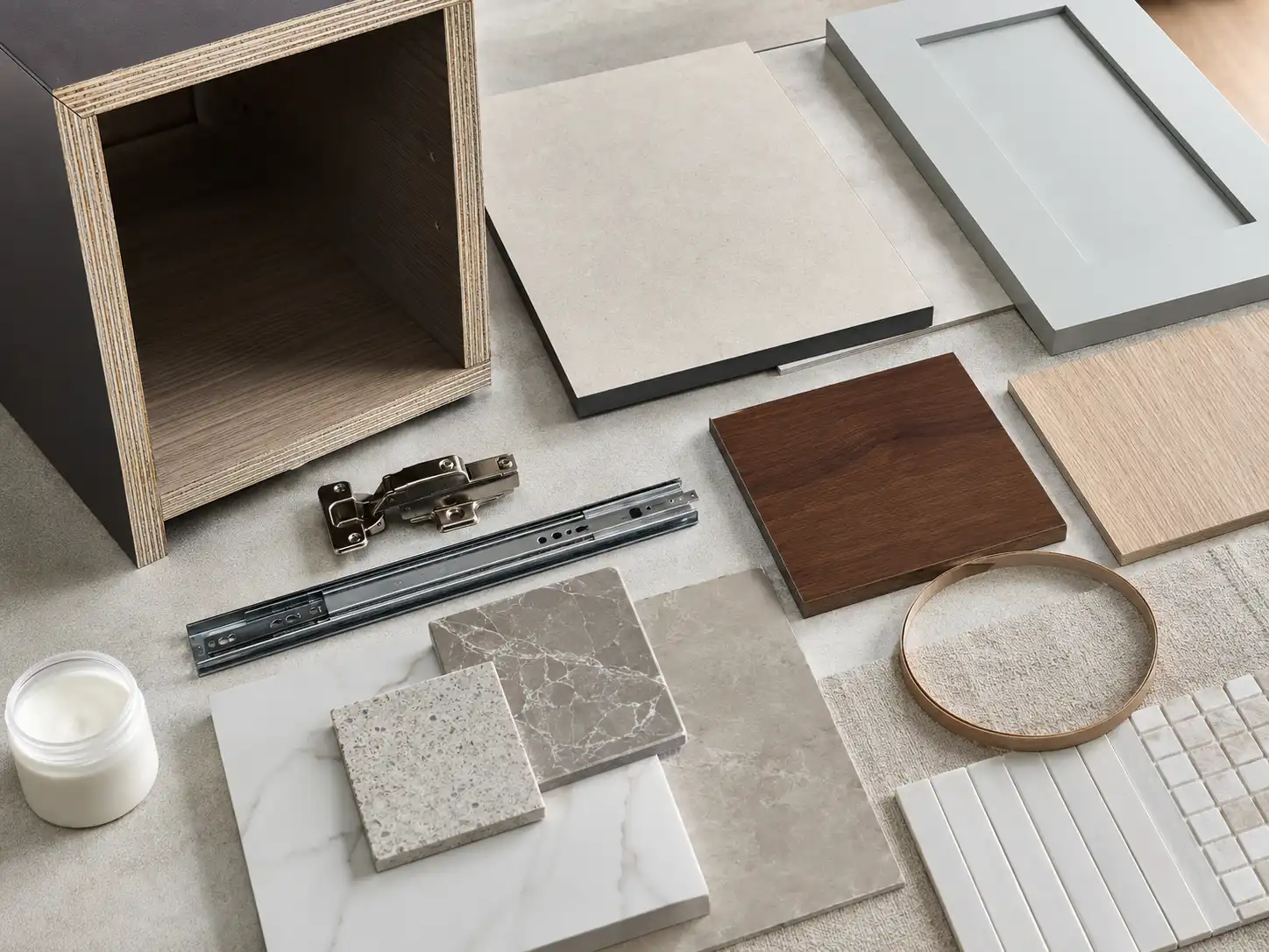 c6e41d6e 4602 4dcc ae06 5fb557df148a Hotel bathroom vanity material samples including plywood, compact laminate, painted MDF, melamine, and veneer.
